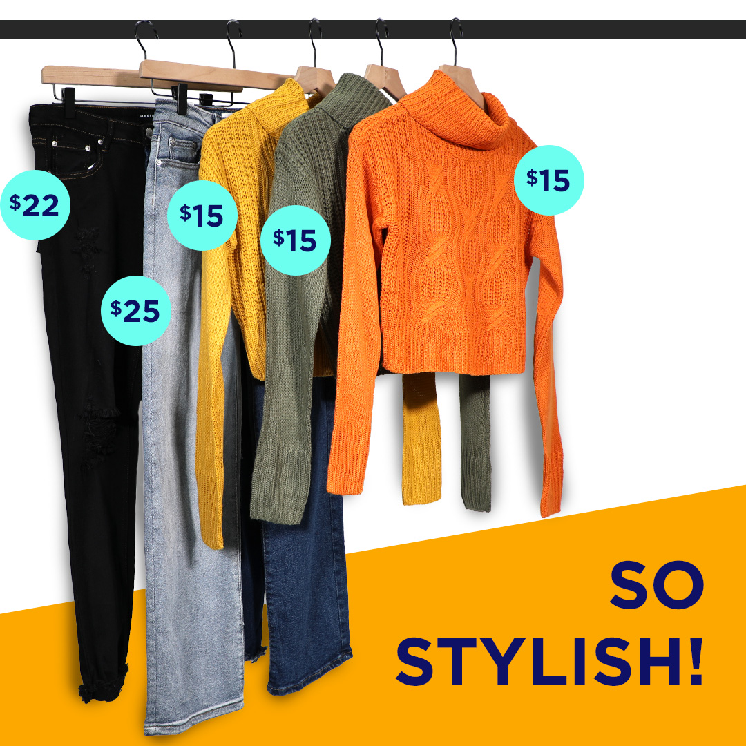 Juniors sweaters and jeans on clothing rack
